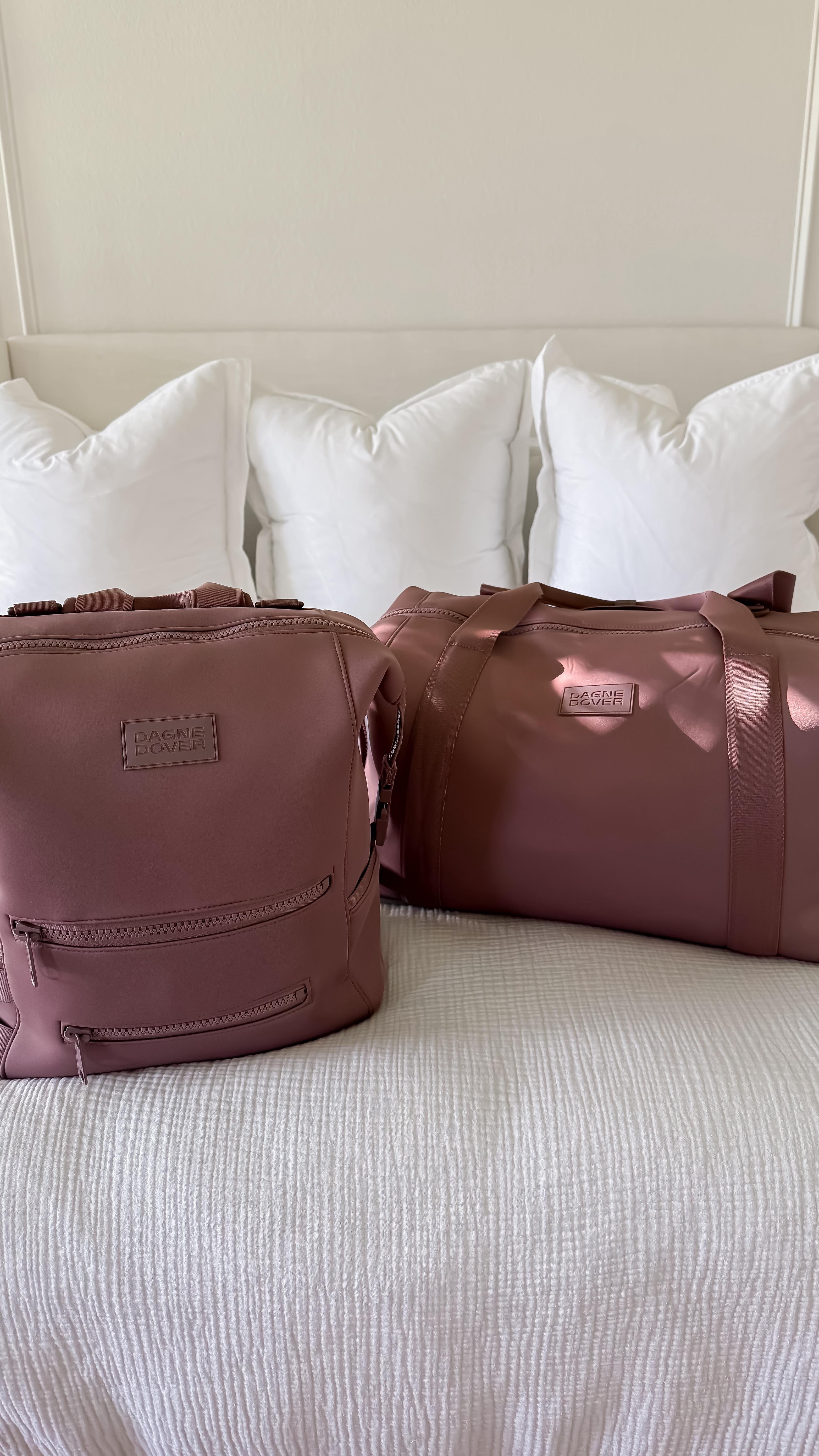 Instagram post by @hannahstemme for Dagne Dover. Caption reads: The color of this diaper bag👶🏼🍼 I love how....