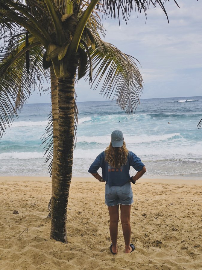 Instagram post by @luciaindurain for Roxy. Caption reads: IsLa del encanto vibeZ 🌸🌈🩵🇵🇷 . . #pr #surfing....