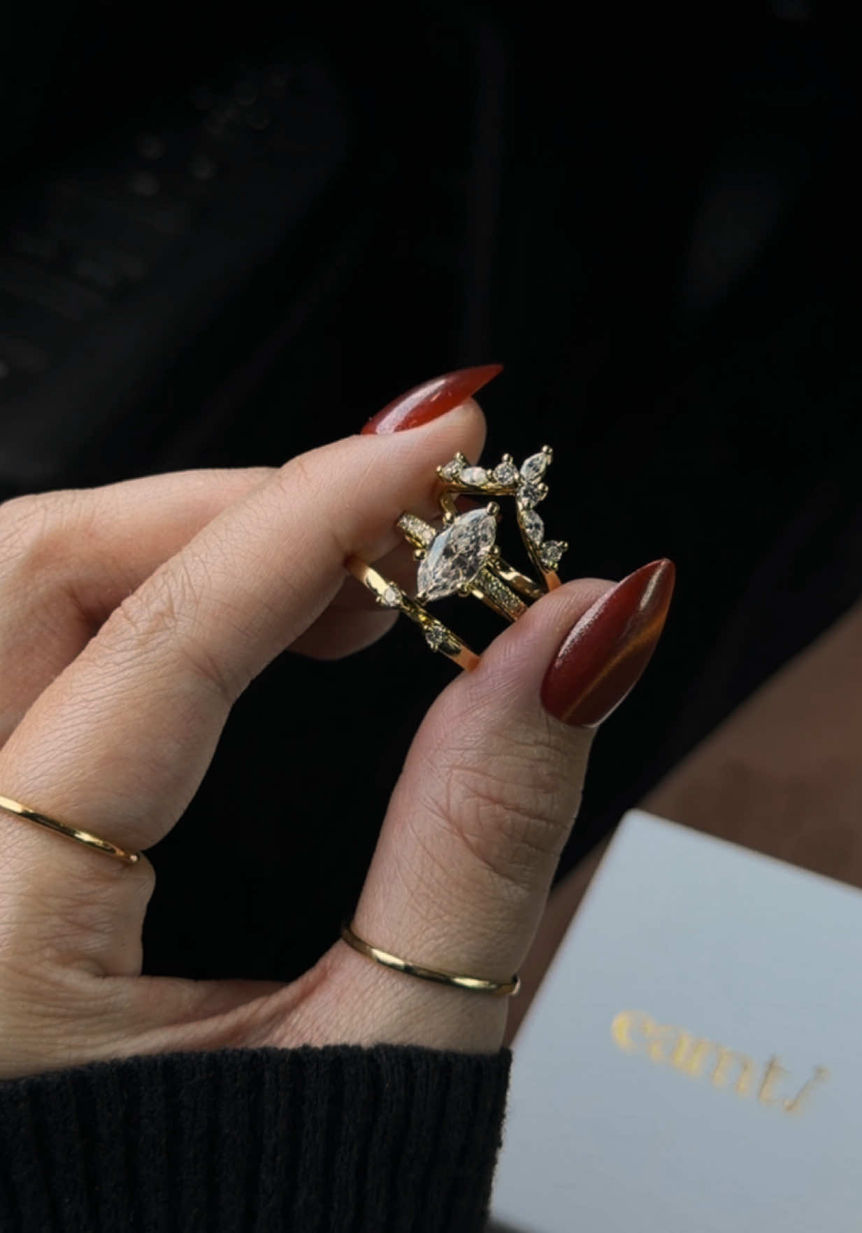 TikTok post by @leahfrzr for EAMTI Jewelry. Caption reads: [...] #bridalstack #ringstack @EAMTI Jewelry.