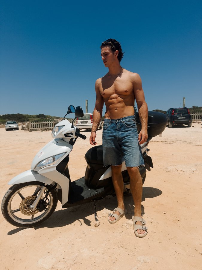 Instagram post by @sebastianpeinemann for Replay. Caption reads: A man on a tanning mission 🇪🇸 w// @replay....