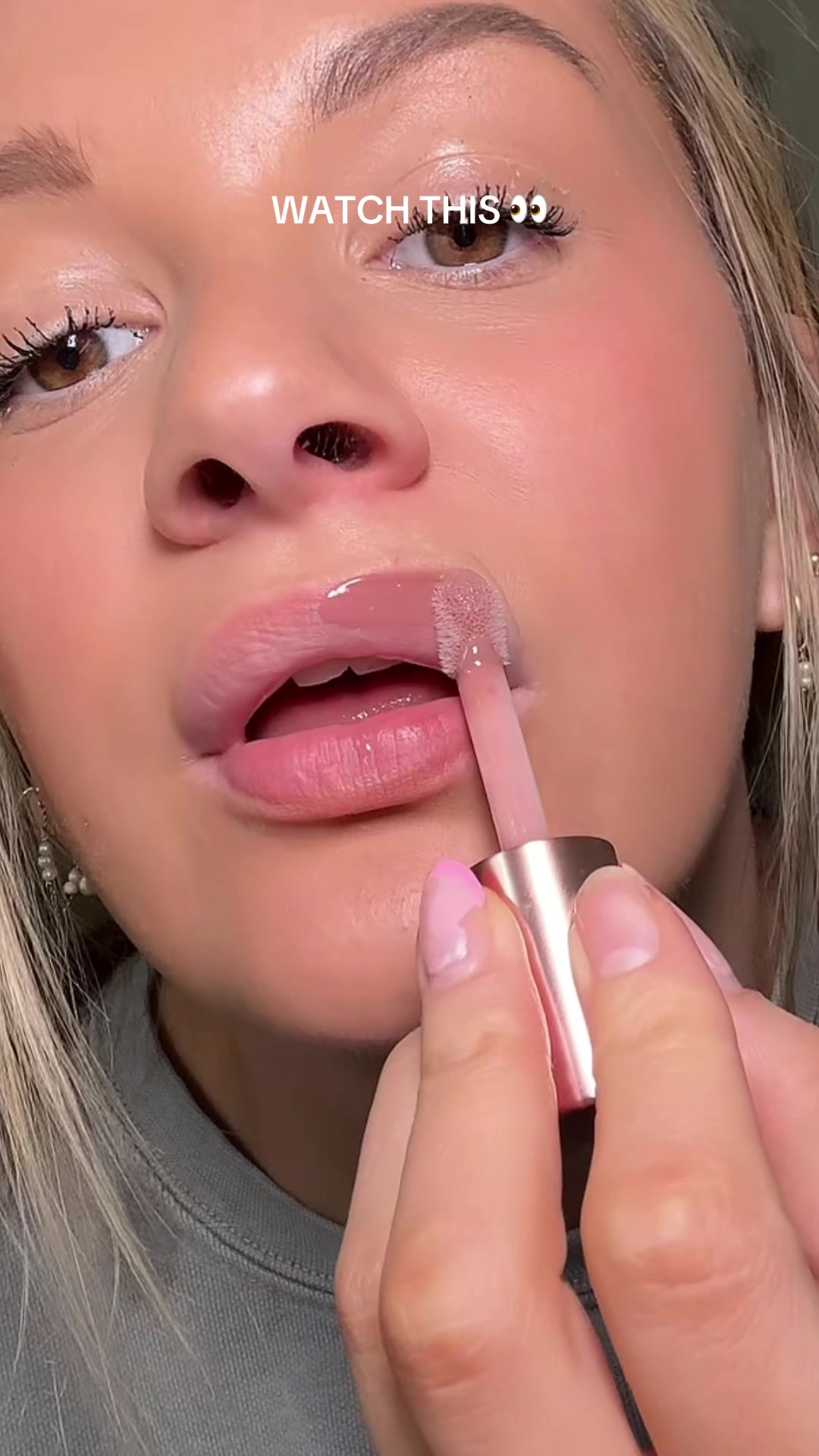 TikTok post by @madstaylorr for LAWLESS Beauty. Caption reads: [...] a lip gloss??? YES PLEADE  #lipgloss....