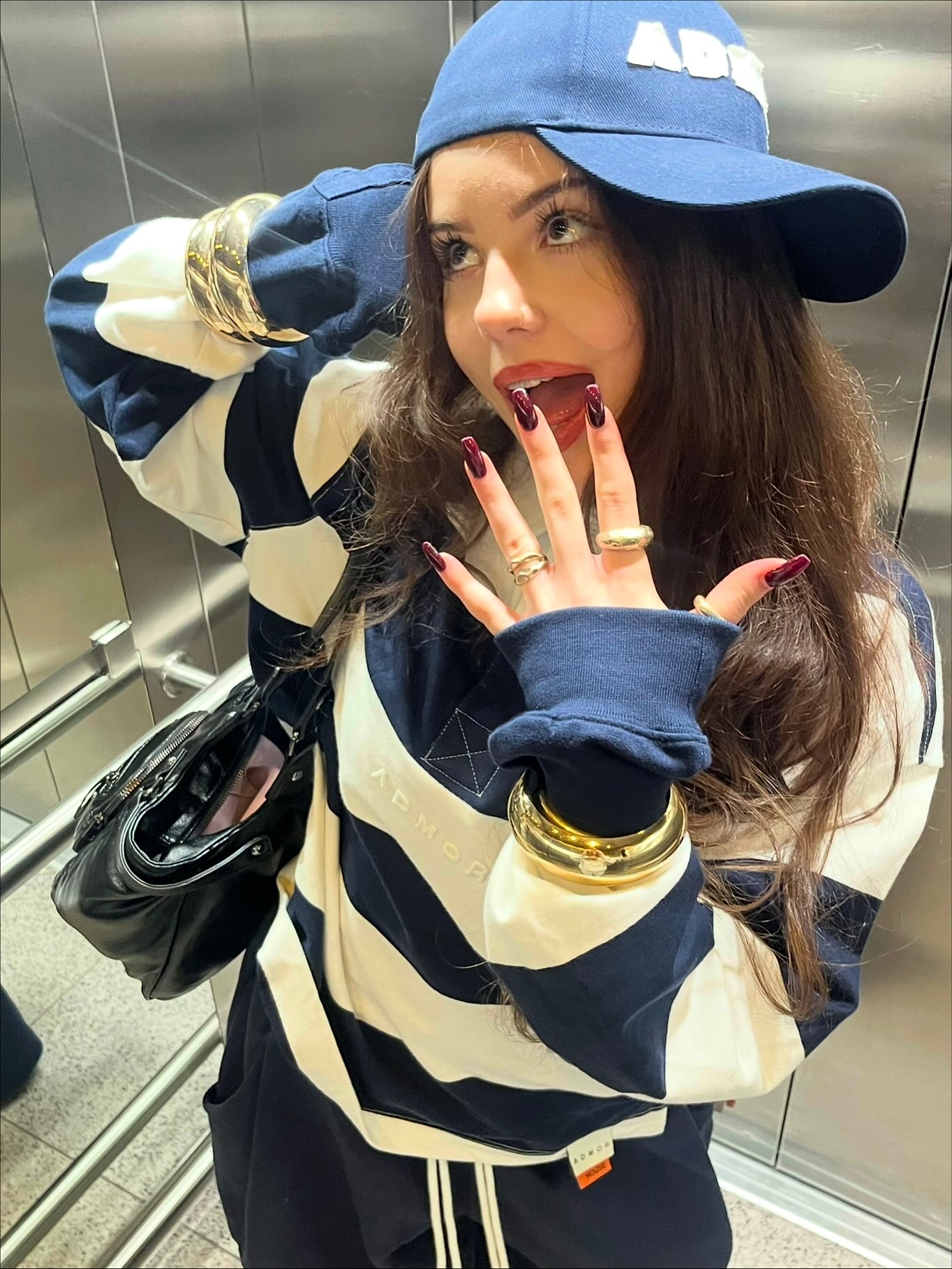 Instagram post by @33majkaaa for House Brand. Caption reads: feeling cozy with @house_brand x @admorco....