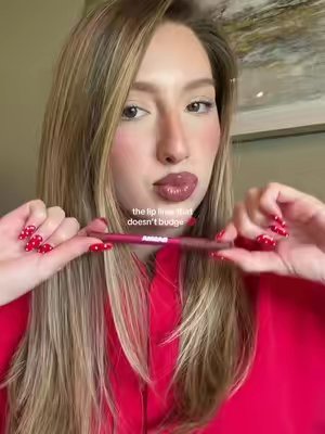 TikTok post by @alyssamslzr for BASMA Beauty. Caption reads: [...] does make the whole lip combo 💋 @BASMA....