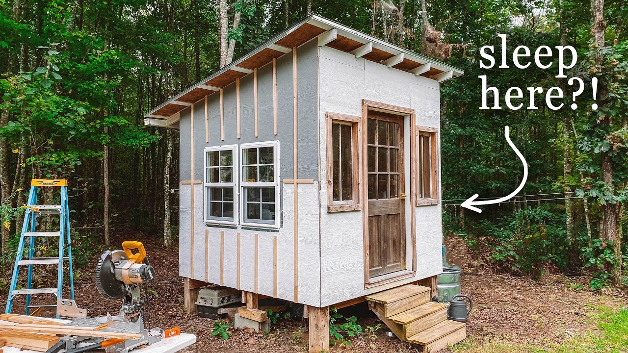 YouTube post by @HEYWANDERER for Battle Born Batteries. Caption reads: Building a tiny cabin, preserving the harvest, &....