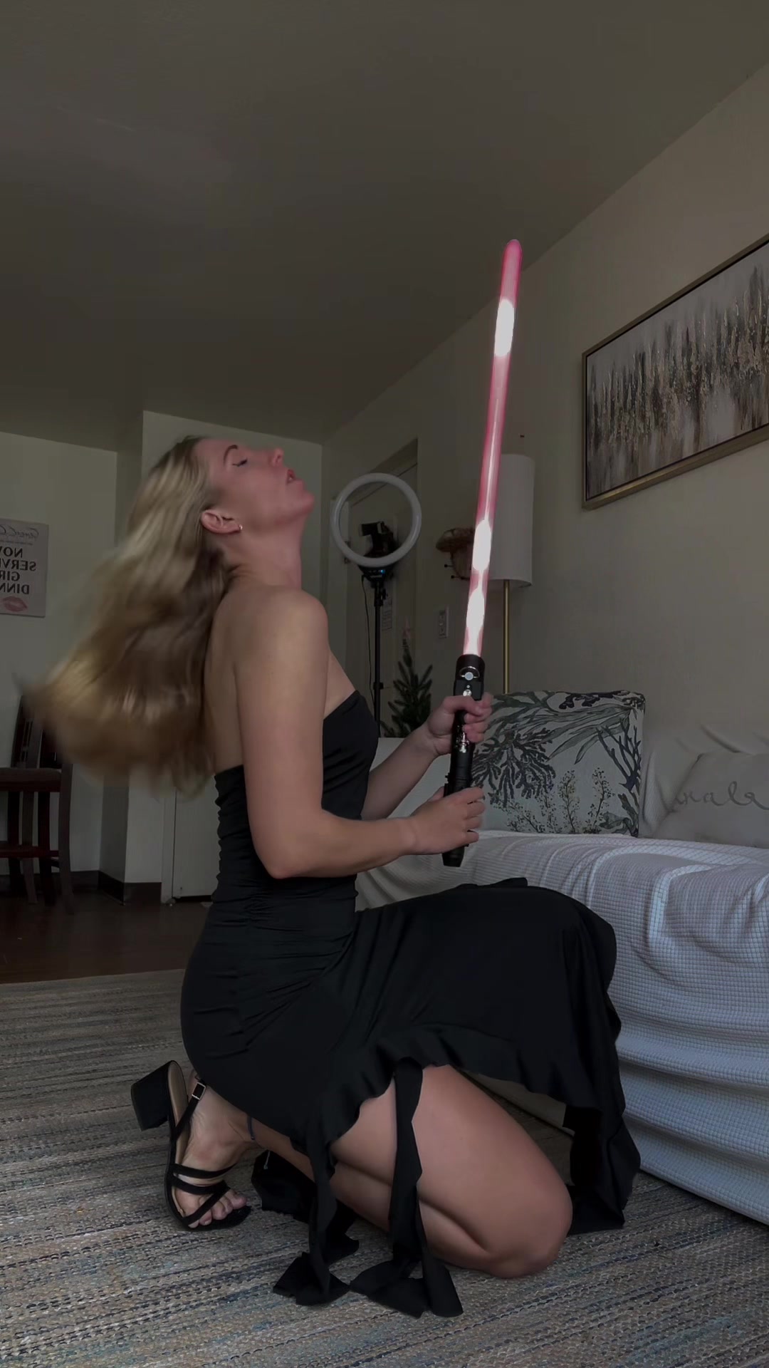 TikTok post by @lava.shea for ArtSabers. Caption reads: Order an @ARTSABERS lightsaber using code:....