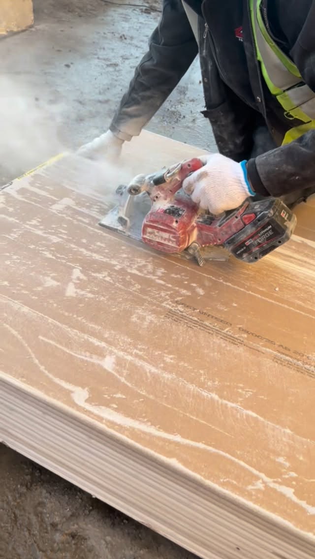 Instagram post by @livinglegendsconstruction for Milwaukee Tool. Caption reads: That’s one way to get rid of drywall....