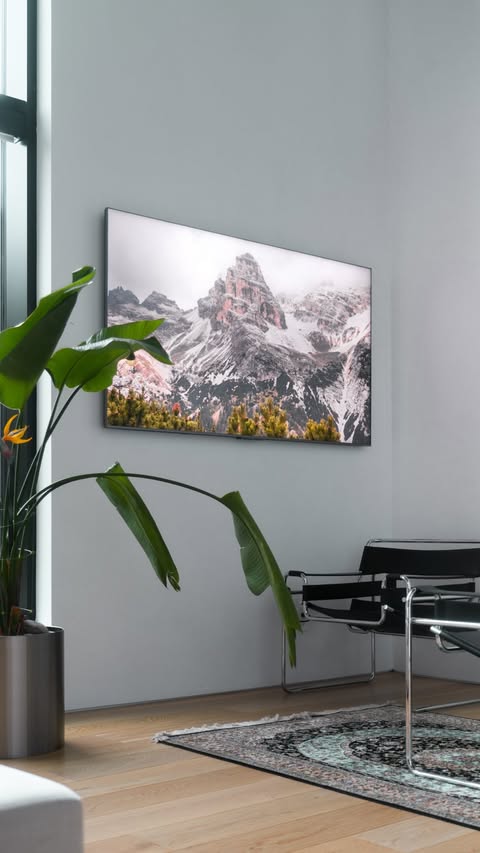 Instagram post by @karlconrad for TCL USA. Caption reads: The new @tcl_usa QM8L SQD-Mini LED TV is the....
