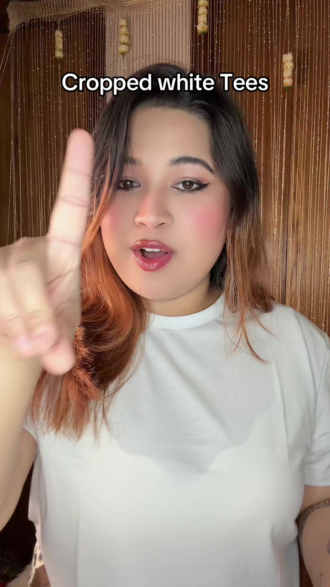 TikTok post by @sabnamraimahato for Cuts Clothing. Caption reads: @Cuts Clothing #whitetees #croppedtee....