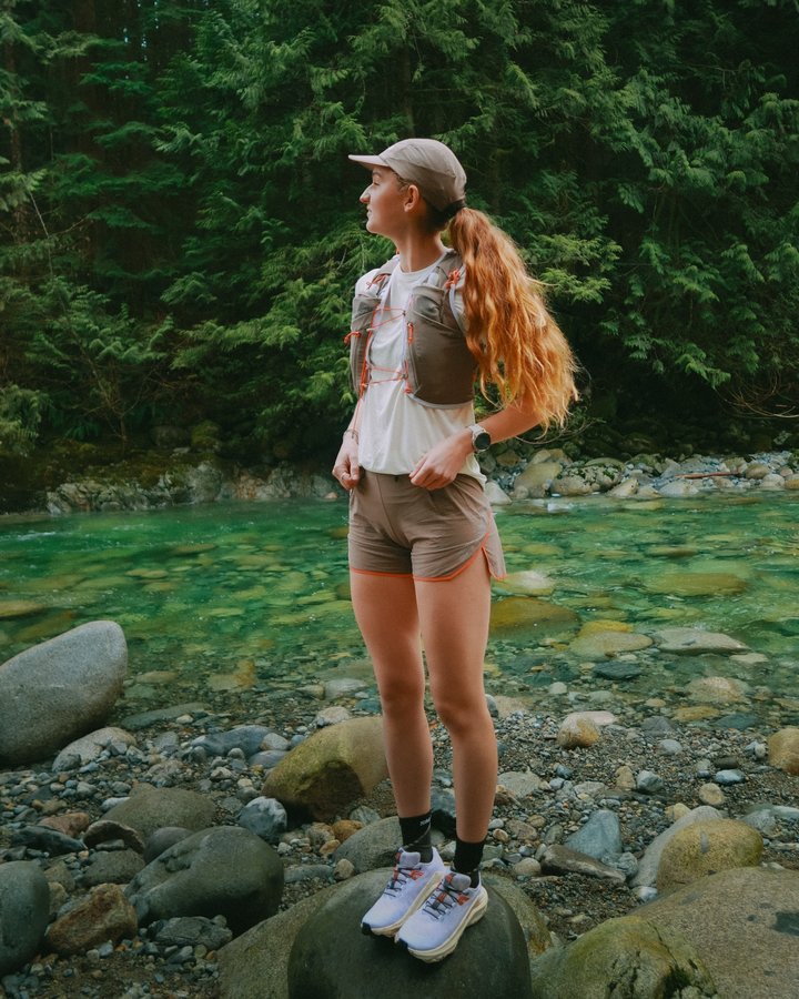 Instagram post by @danimarielister for Salomon. Caption reads: Running in the ADV Skin 12 hydration vest with....