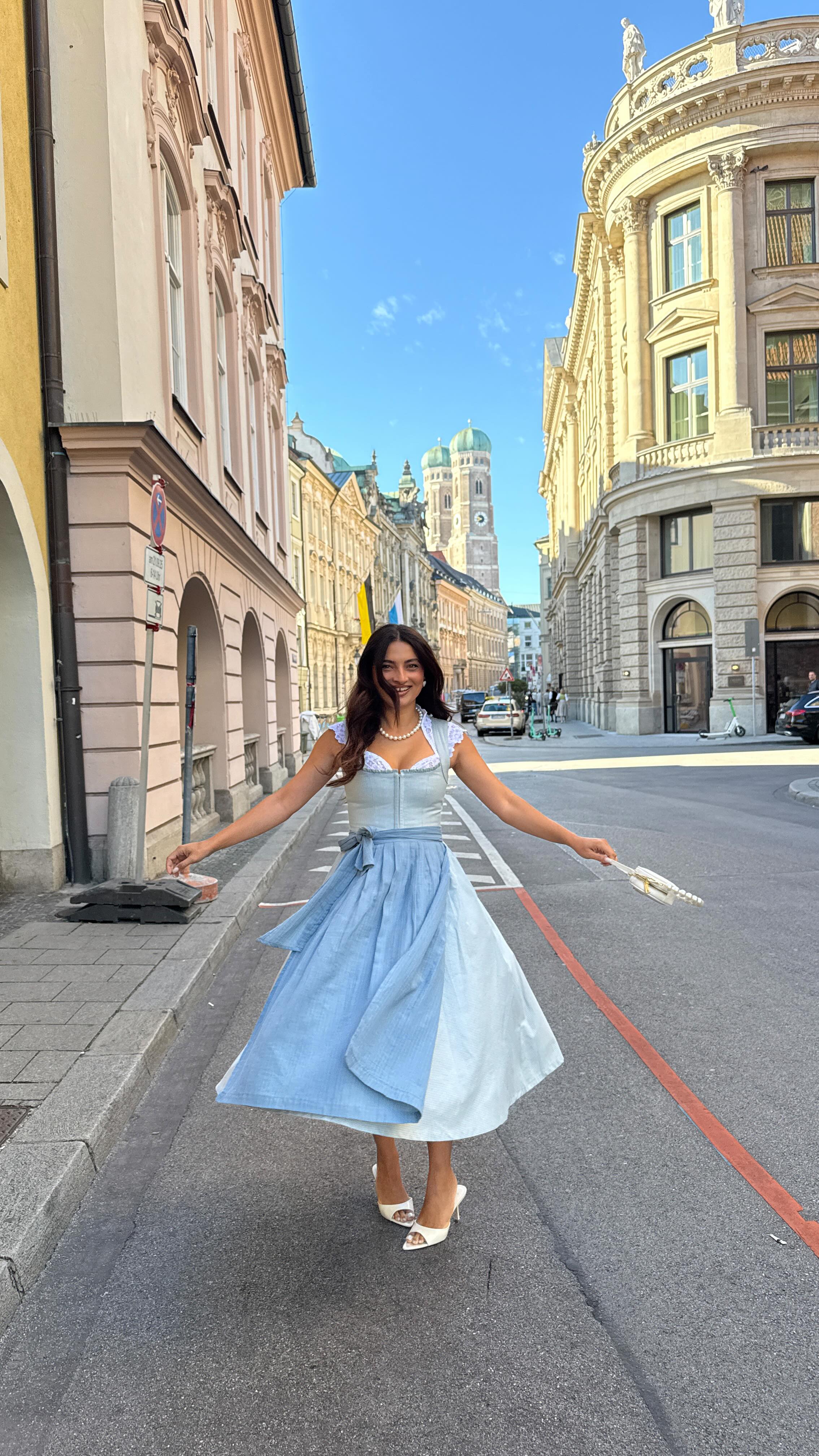 Instagram post by @mernahermez for WEAT. Caption reads: [...] let‘s gooo! Dirndl @cocoverotrachten Bag....