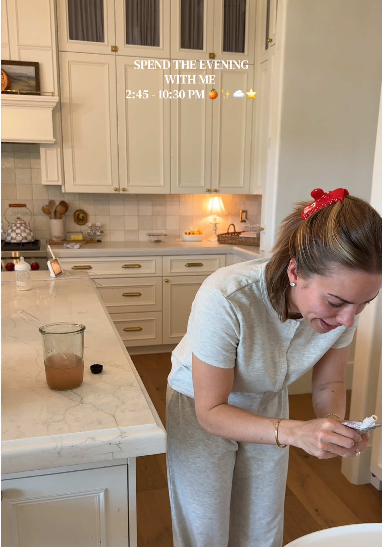 TikTok post by @emiliekiser for OLEHENRIKSEN. Caption reads: SPEND THE EVENING WITH ME🥺💛🎀🍰 AND....