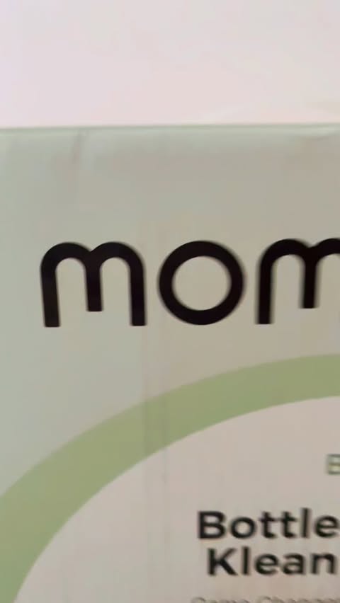 Instagram post by @nathan_nora_ for Momcozy. Caption reads: @momcozy.uk  @momcozy @momcozy_evelyn  meet our....