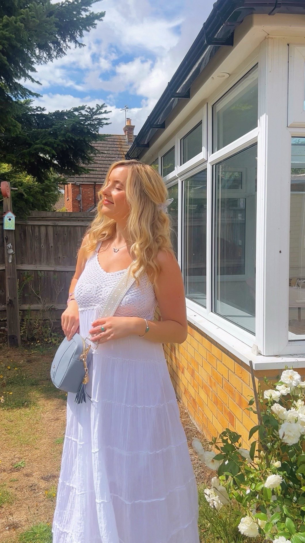 Instagram post by @emmacharlotte.rose for Pom Pom London. Caption reads: [...] me ✨🩵👜 

the prettiest bag from....