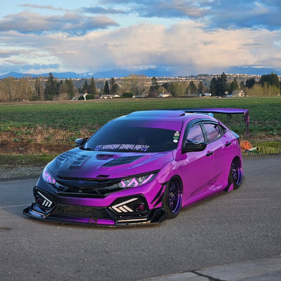 Instagram post by @thatdirtycivic for RAXTiFY. Caption reads: 💜💜💜 Wrap made by @raxtify_official Wrapped by....