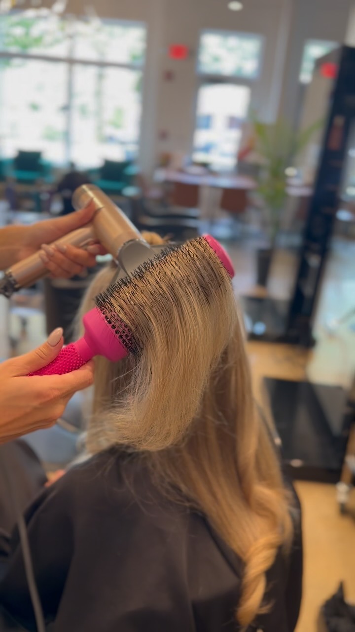 Instagram post by @jessegorkaobrien for ERGO Styling Tools. Caption reads: [...] a limited edition pink brush from....