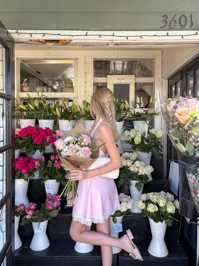 Instagram post by @rachellmeador for Beginning Boutique. Caption reads: Flower season 🌸🌿🌷 #beginningboutique....