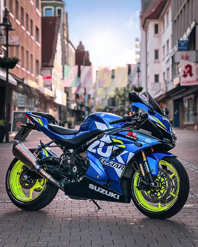 Instagram post by @hntr45_ for Suzuki. Caption reads: [...] #bikeworld #scprojectexhaust #suzukigsxr....