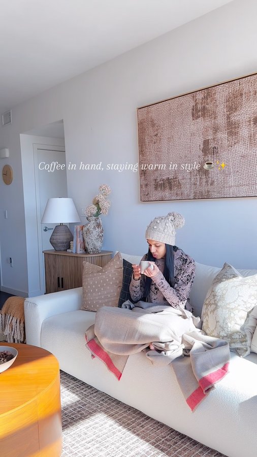 Instagram post by an influencer for alicia adams alpaca. Caption reads: [...] this cap and throw from @aliciaadamsalpaca....