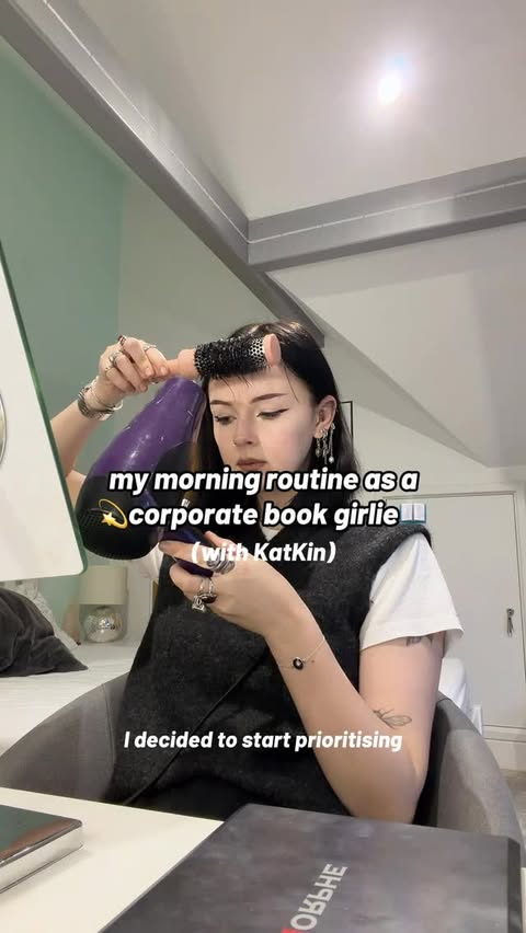 Instagram post by @bookswithgray for KatKin. Caption reads: [...] routine as a corporate book girlie with....