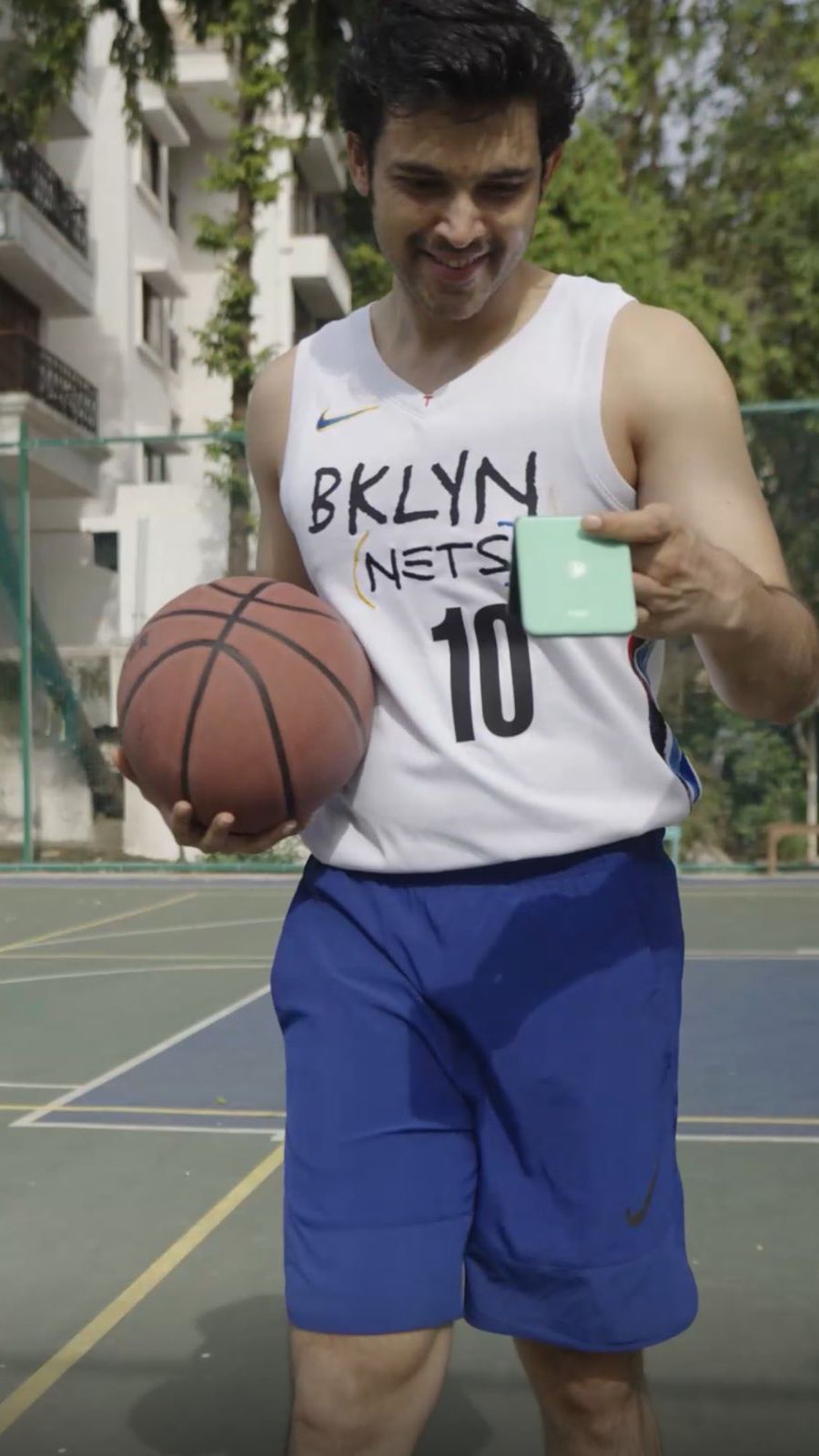 Instagram post by @the_parthsamthaan for Motorola. Caption reads: Court moves 🔁 Flip moves 🔁 Smooth moves. All in....