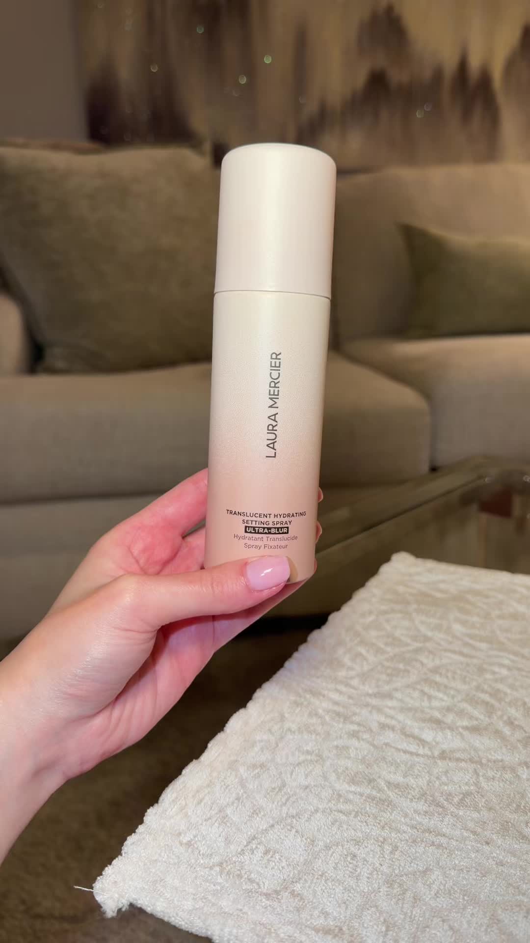 TikTok post by @psychicizzy for Laura Mercier. Caption reads: @Laura Mercier #lauramercier .