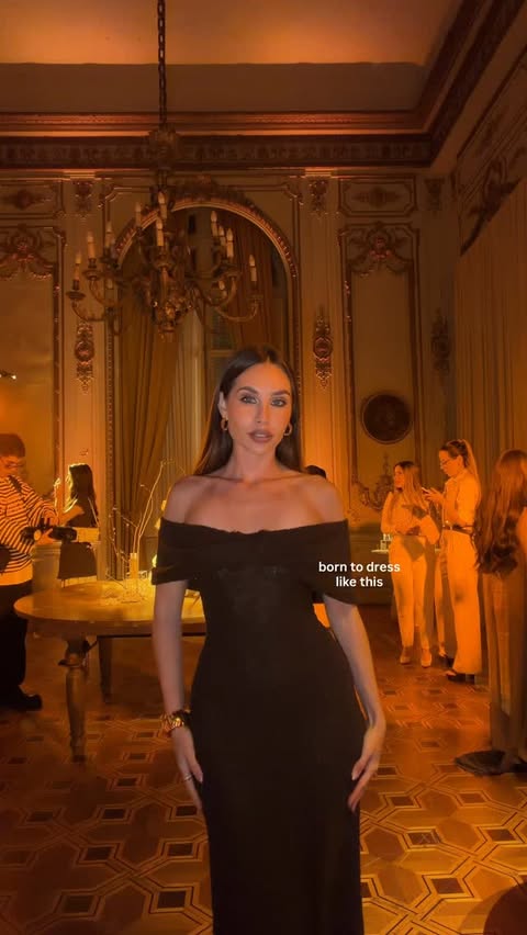 Instagram post by @melinabudek for REVOLVE. Caption reads: my dress @revolve 🤎 #fitcheck #eleganceoutfit....