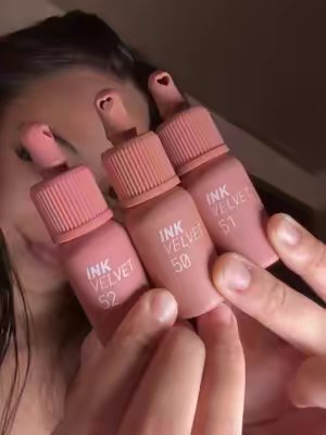 TikTok post by @ugc.shysty for Skin Seoul. Caption reads: one lip tint doing the MOST 👀🤎 used #50 Creamy....