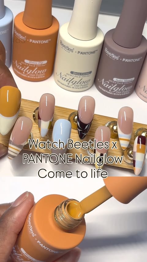Instagram post by @theenailfactory for Beetles Gel Polish. Caption reads: Autumn Inspired Set with @Beetlesgelpolish 🍂🩵....