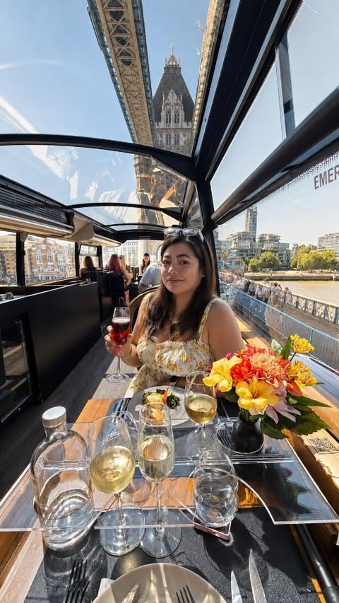 Instagram post by @mumandherlittle.explorer for London | Explore. Caption reads: Ad/gifted. Lunch with a side of Tower Bridge 🍷🚌....