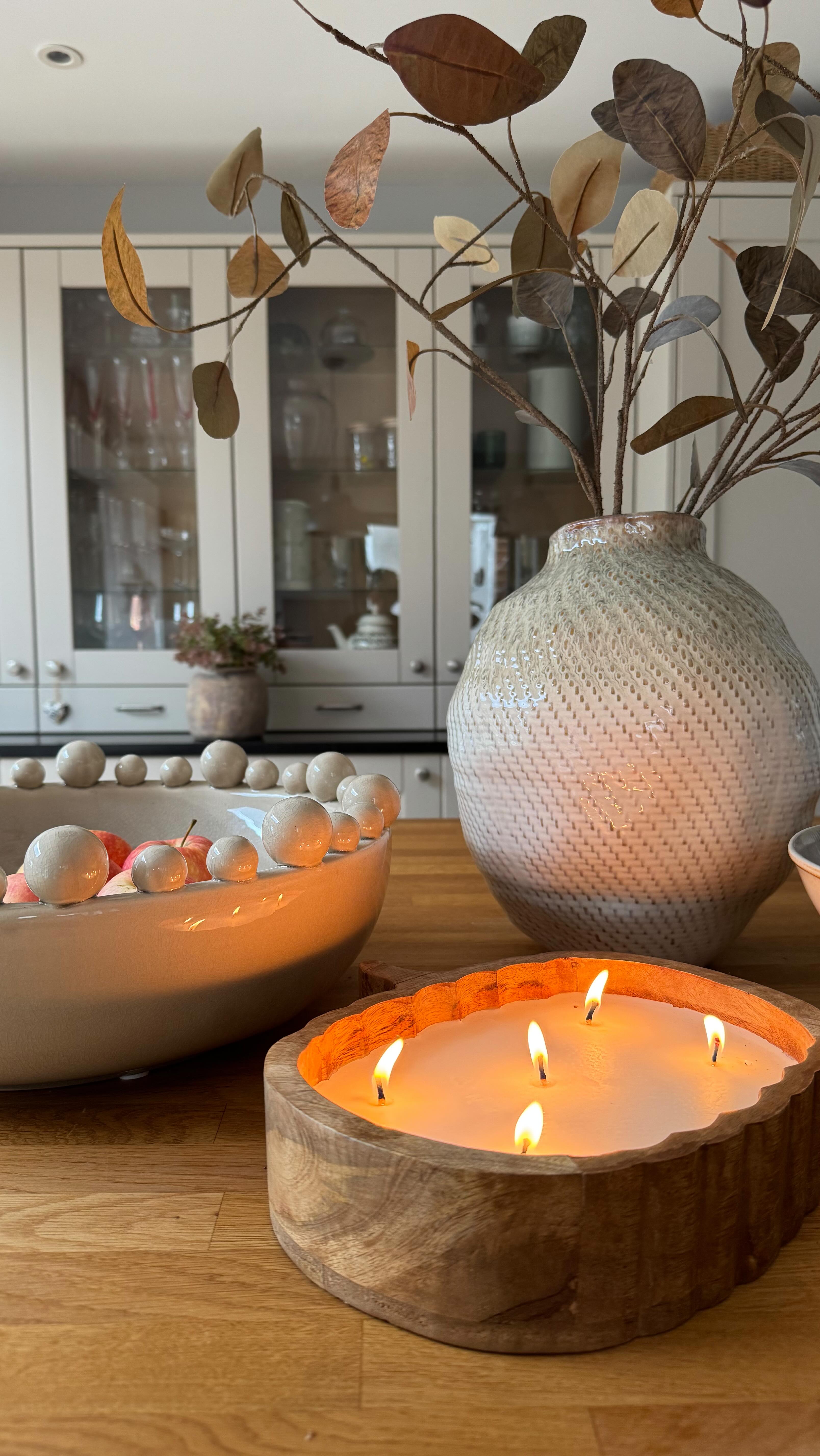 Instagram post by @oakenhome for Olivias. Caption reads: Here’s the viral @aldispecialbuysuk pumpkin candle....