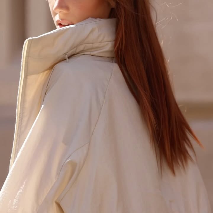 Instagram post by @lacoscione for Herno. Caption reads: a tribute to the beauty of the changing seasons....