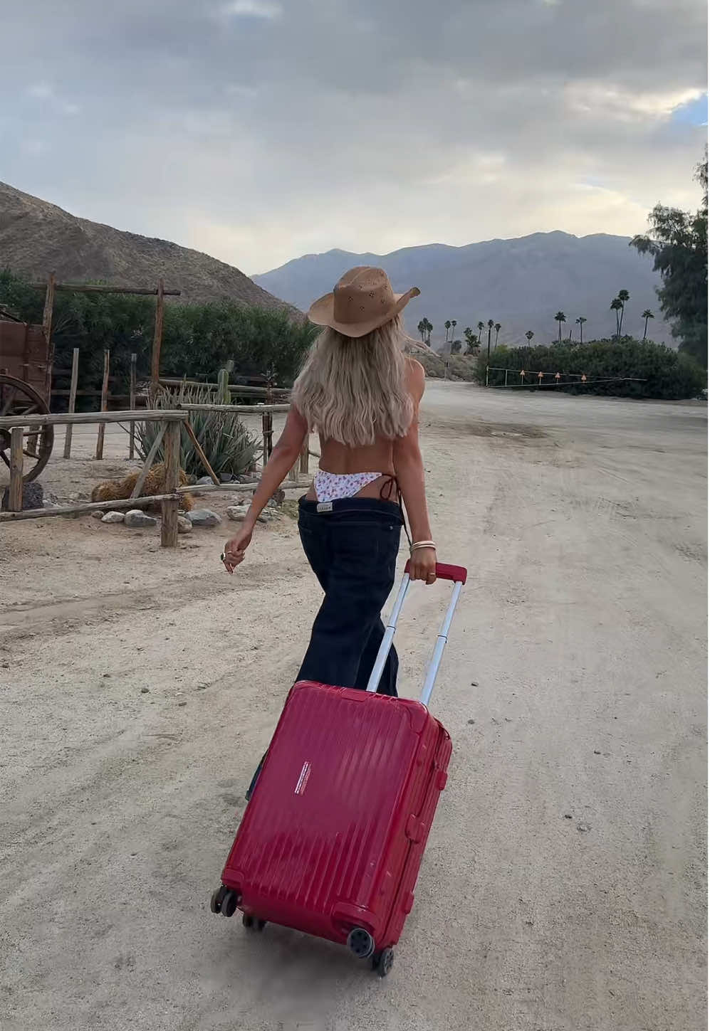 TikTok post by @saffronbarker for Kulani Kinis. Caption reads: [...] camera man involved on set for my @Kulani....