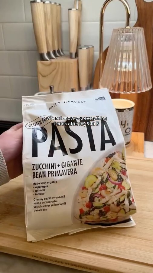 Instagram post by @claudiaaharrington for DAILY HARVEST. Caption reads: Dinner shortcut with @dailyharvest !! 🍝....