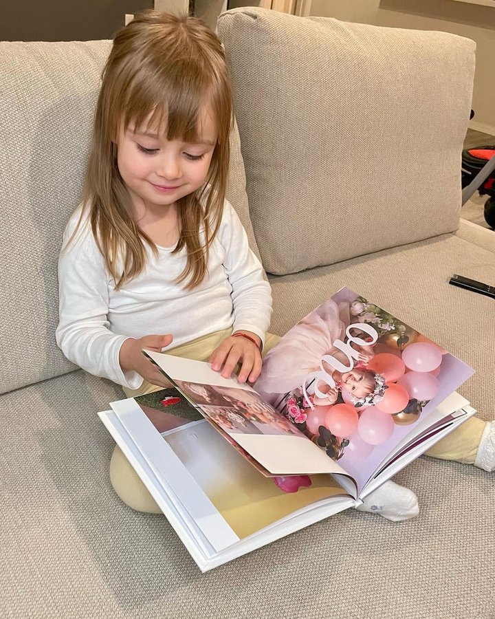 Instagram post by @kremtd for Optimalprint. Caption reads: [...] calendars and photo books from @optimalprint....