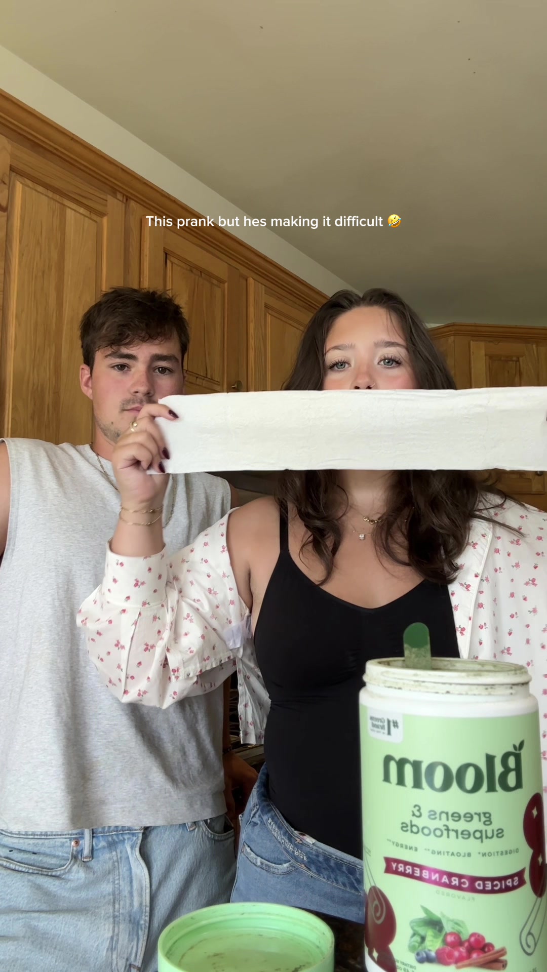 TikTok post by @addie_mccracken123 for Bloom Nutrition. Caption reads: [...] hes too suspicious hahahah so funny @Bloom....