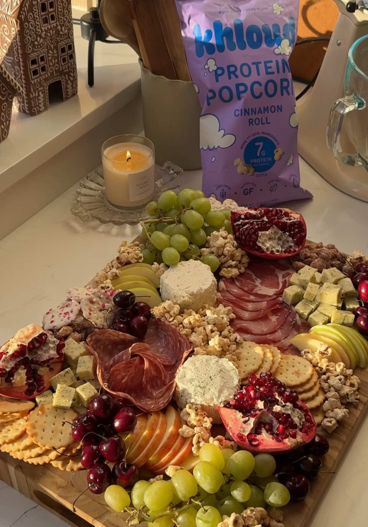 TikTok post by @lauren_woods_ for KhloudFoods. Caption reads: Make a holiday charcuterie board with me ft.....