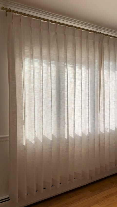 Instagram post by @glennycastillo__ for Twopagescurtains. Caption reads: I completely transformed my space with these Liz....