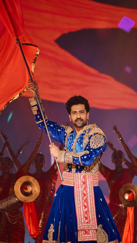 Instagram post by @vickykaushal09 for ZEE. Caption reads: [...] grandeur! Watch me perform at the 24th Zee....