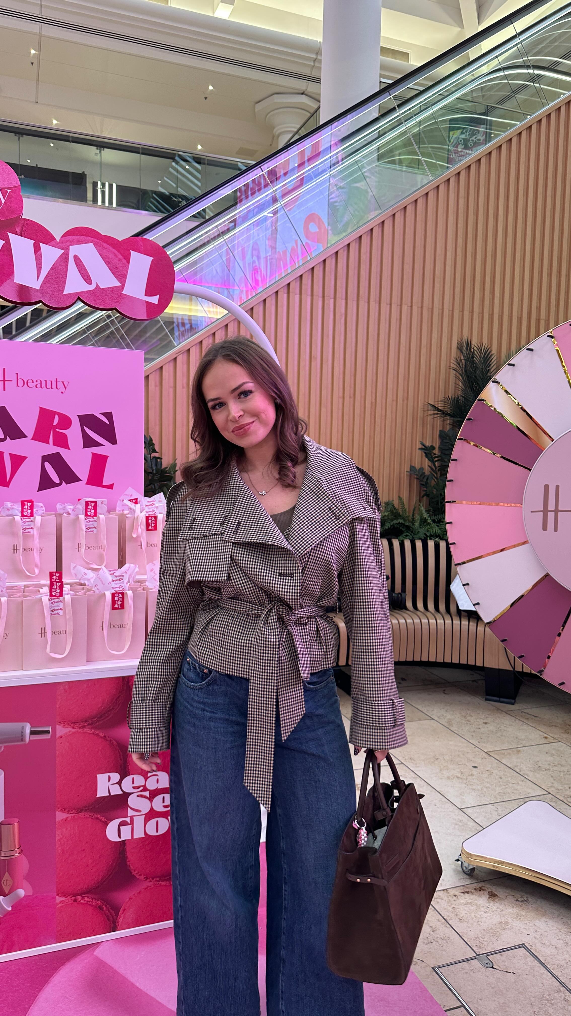 Instagram post by @emiliarosecooke for Harrods. Caption reads: Ad I had the BEST morning @harrodsbeauty carnival....