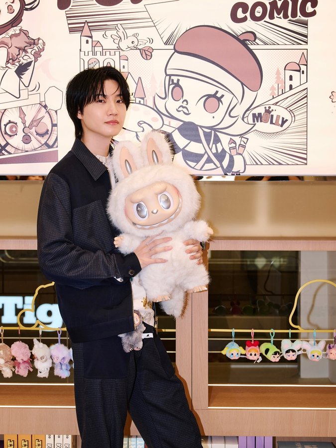 Instagram post by @dorisakurada for Pop Mart. Caption reads: POP MART....