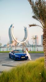 Instagram post by @nihalnoooh for Passion Passport. Caption reads: Partnering with @bmwqatarofficial 

As content....