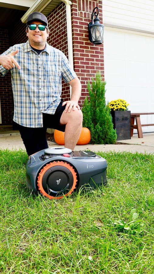Instagram post by @charlieandcrewdad for Segway Navimow. Caption reads: If you are ready to save time from mowing your....