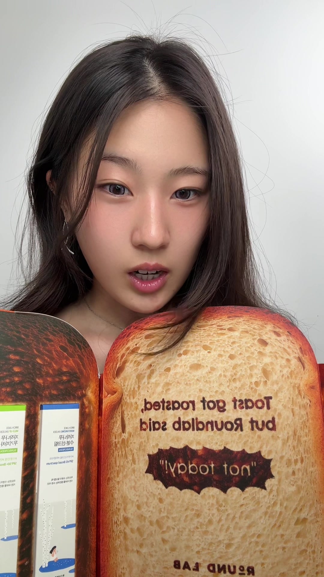 TikTok post by @yonny_yy for Round Lab. Caption reads: [...] or physical sunscreens? #roundlab #sunscreen....