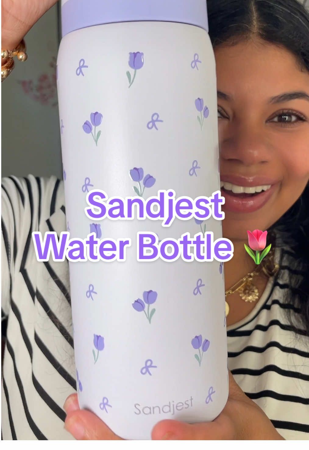 TikTok post by @itsallemilyevans for Sandjest. Caption reads: @SANDJEST #sandjest #waterbottle #tumbler [...].