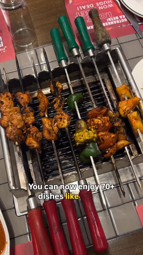 Instagram post by @bread_n_beer_babe for Barbeque Nation. Caption reads: Hey Foodies! 🍴 Barbeque Nation Lekar Aaya Hai....