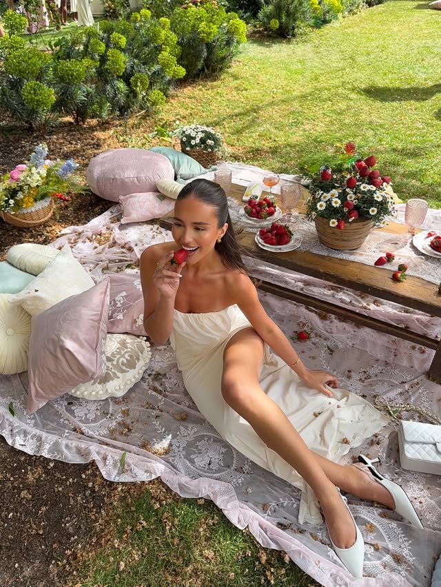 Instagram post by @tillypegg_ for OH POLLY. Caption reads: A spring picnic 🍓 @ohpolly ad.