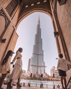 Instagram post by @talinegabriel for Burj Khalifa by Emaar. Caption reads: A trip to Dubai is not complete without a visit to....