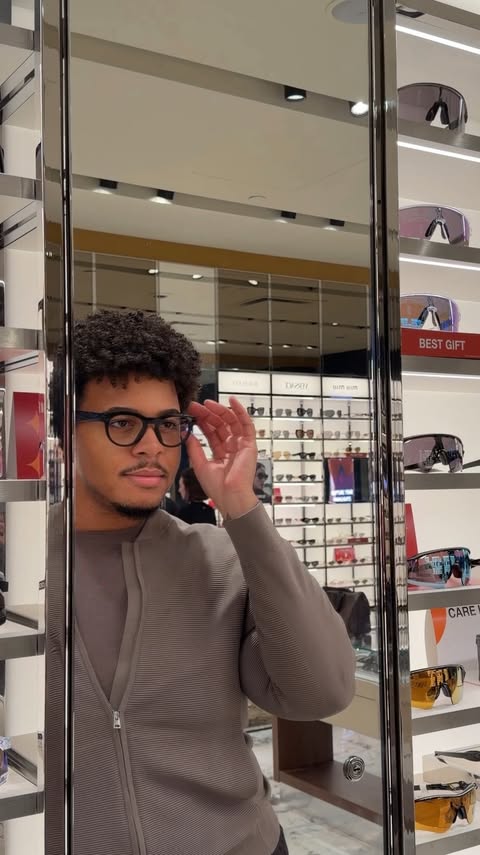 Instagram post by @scotlouie for Sunglass Hut. Caption reads: [...] of fabulosity this holiday season....