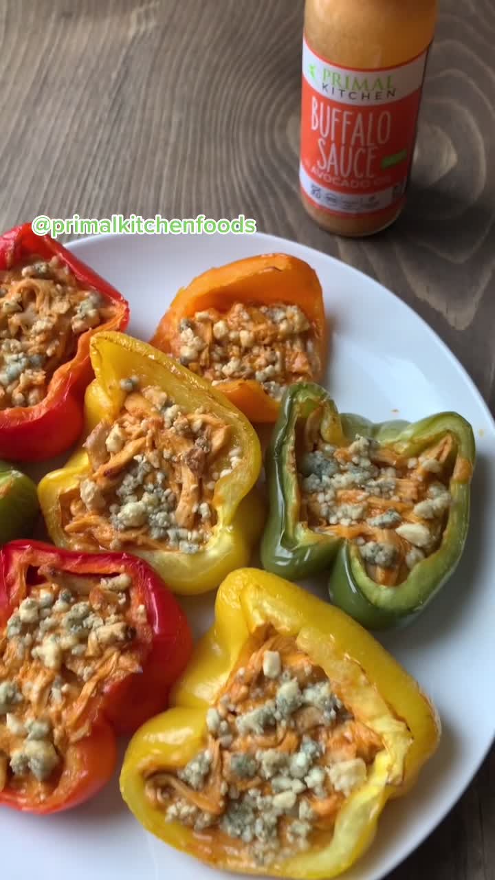 TikTok post by @paigefaustini.rd for Mark's Daily Apple. Caption reads: Buffalo chicken stuffed peppers using....