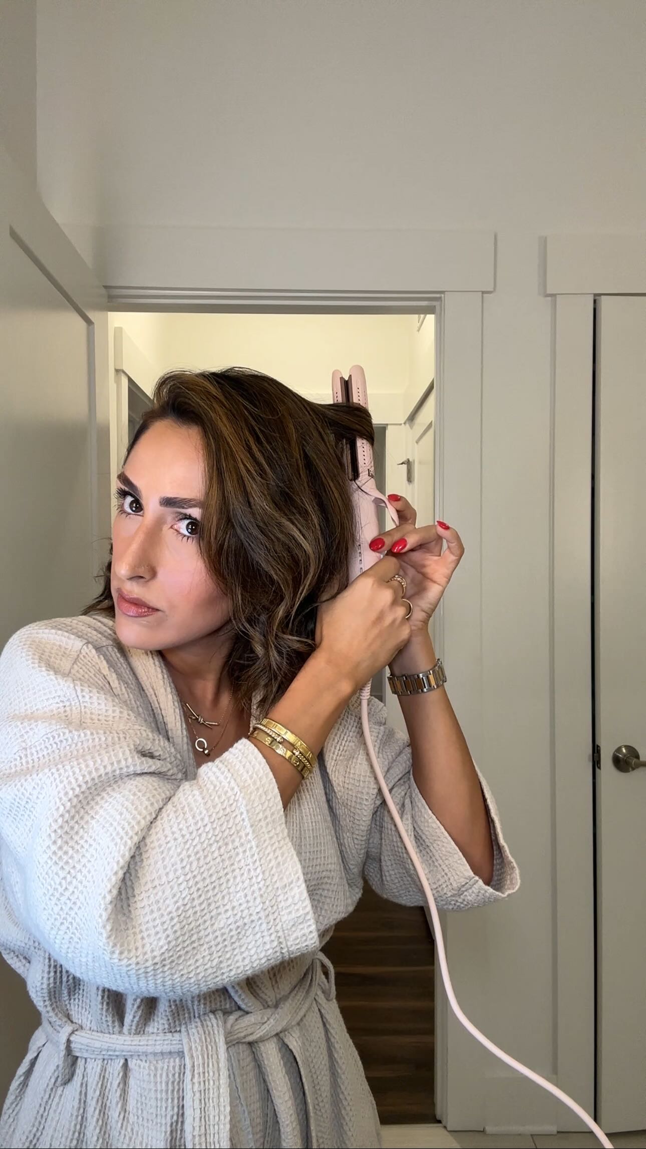 Instagram post by @leilaesmaeili for L’ange Hair. Caption reads: Let’s style my hair 14 months post chemo & cold....